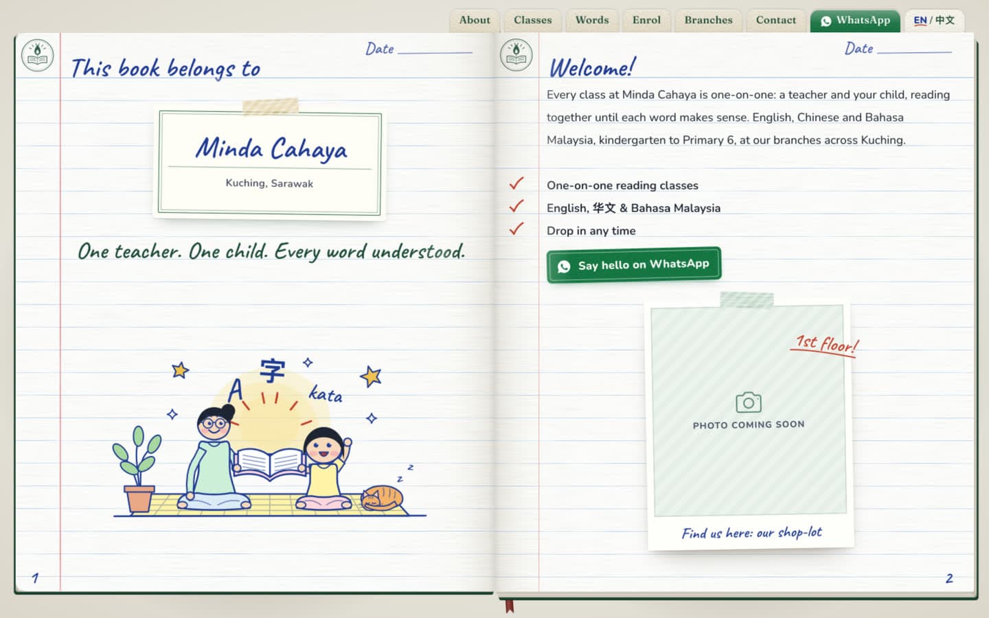 The notebook open at its first spread: name card and welcome page